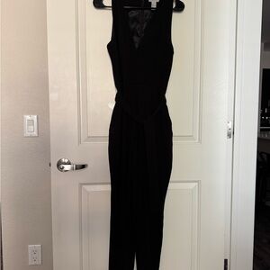 H&M Black Sleeveless Jumpsuit with Fitted Silhouette